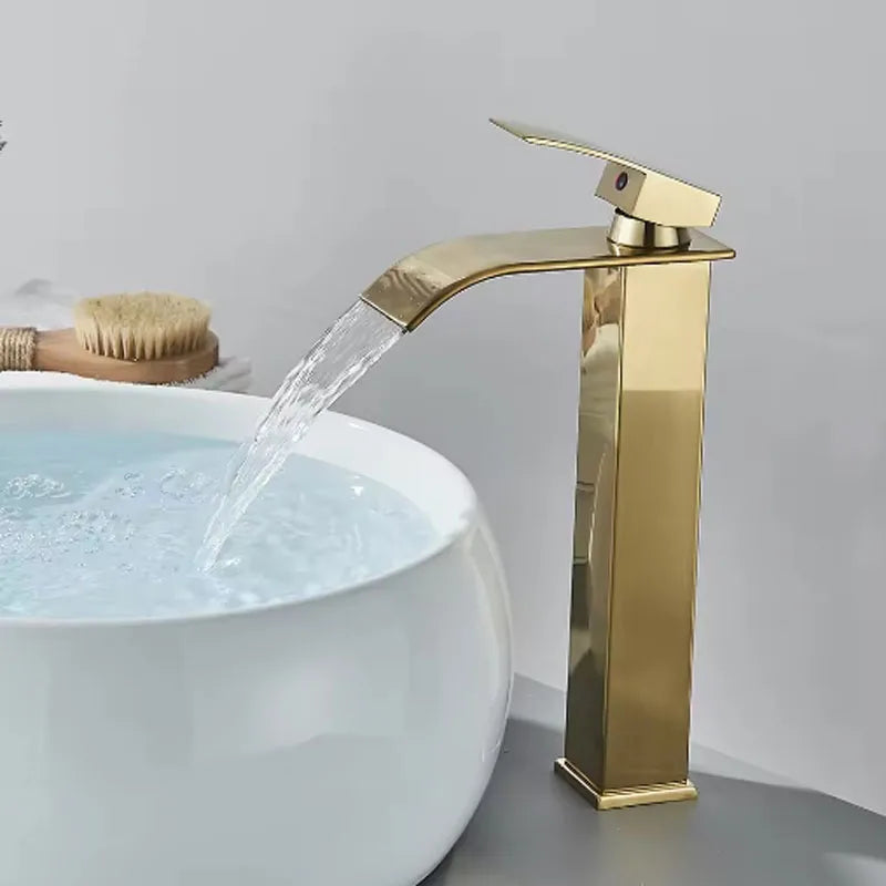 Brushed gold waterfall bathroom faucet by FanzyMarket with single lever, deck-mount basin mixer, stainless steel ceramic valve.