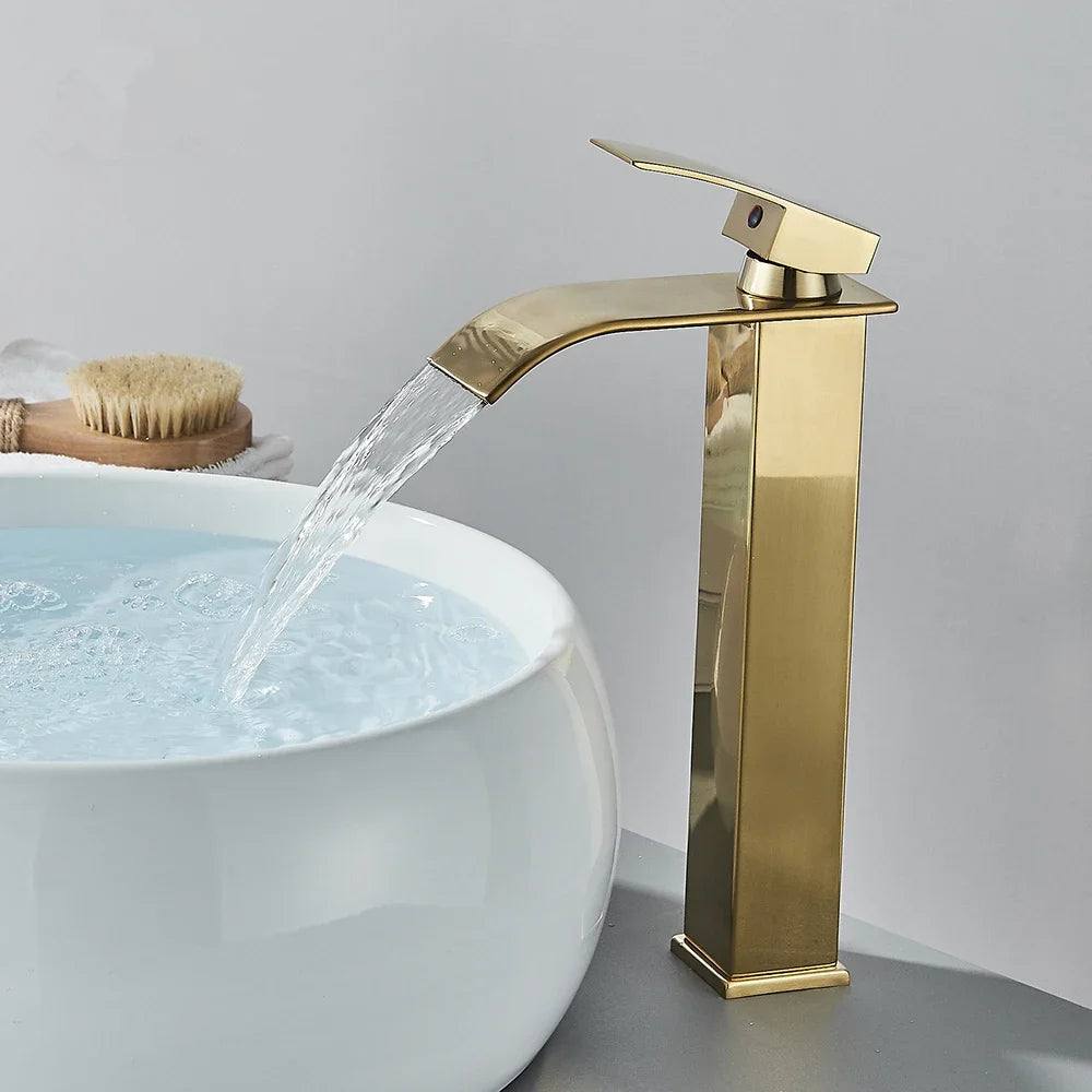 Brushed gold waterfall bathroom faucet by FanzyMarket, single lever deck-mount basin mixer with stainless steel ceramic valve.