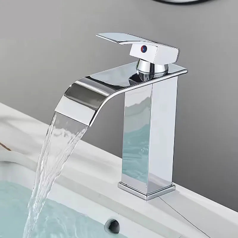Brushed gold waterfall bathroom faucet by FanzyMarket, single lever deck-mount basin mixer with ceramic valve and single hole installation.