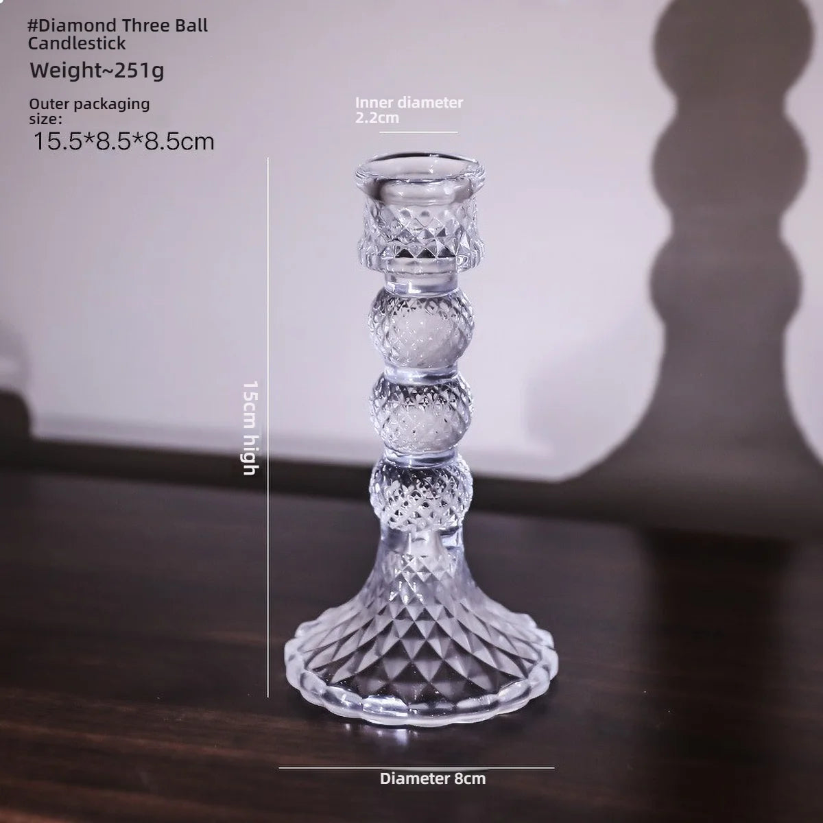 Clear glass pillar candle holder by FanzyMarket, designed for dining room decor, featuring a sleek, transparent candlestick for elegant ambiance.