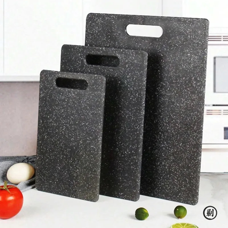 FanzyMarket black marble texture antibacterial cutting board, dishwasher safe for vegetable chopping in kitchen and dining areas.