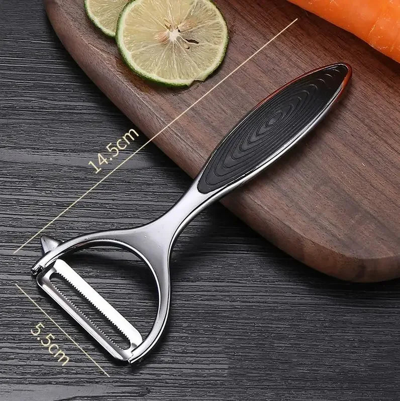 FanzyMarket stainless steel vegetable peeler with julienne, serrated, and straight blades for potatoes, carrots, and fruit.