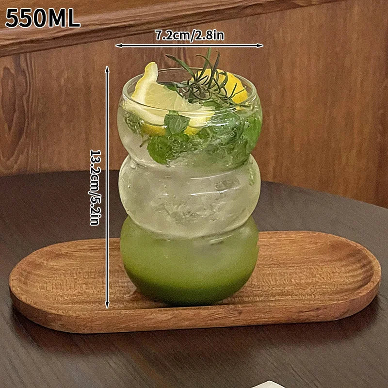 Vertical striped clear glass cup by FanzyMarket, perfect for milk tea, coffee, or juice, with an aesthetic design.