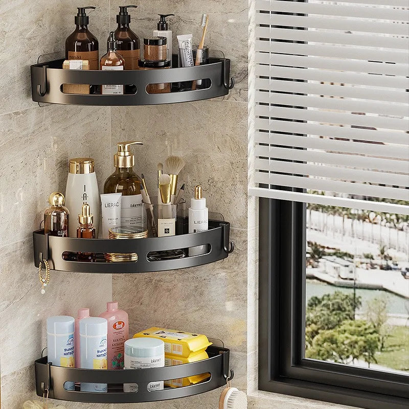 Set of three FanzyMarket adhesive bathroom shelves and shower caddies, no-drill corner towel holders, floating storage organizers.
