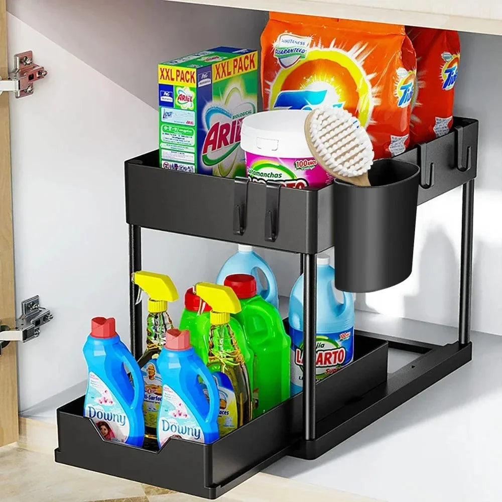 FanzyMarket black 2-tier under-sink sliding cabinet organizer with hooks and hanging cup for bathroom and kitchen storage.