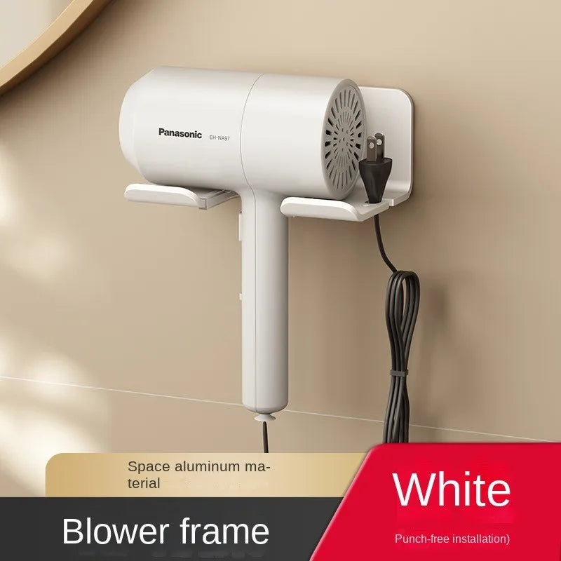 FanzyMarket black aluminum wall-mounted hair dryer and straightener holder on bathroom organizer shelf, no-drill installation, sleek storage.