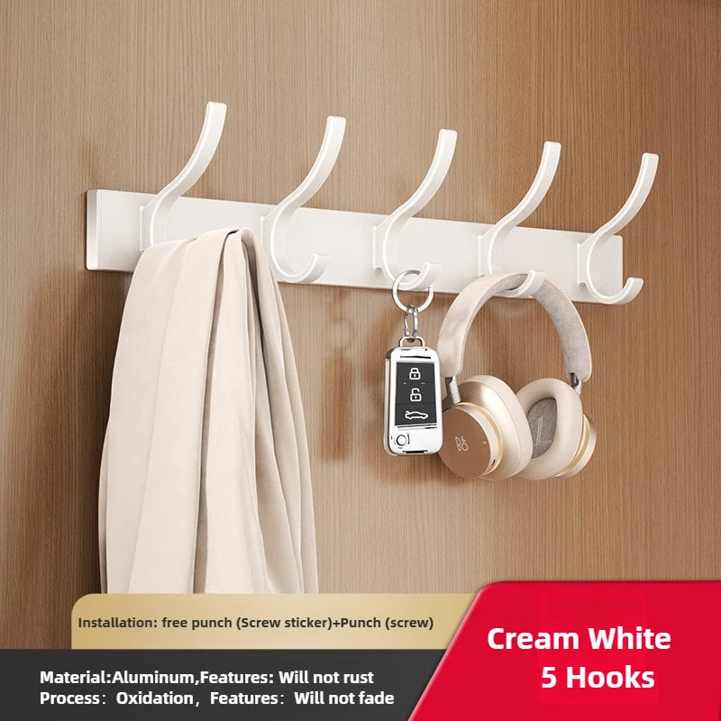 FanzyMarket 6-Peg Folding Wall Hooks in black and white, aluminum nail-mount towel and coat rack attached to a wall.