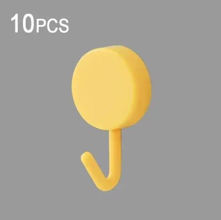 FanzyMarket 10-pack self-adhesive wall hooks, plastic towel hangers for bathroom and kitchen doors, no drill installation.