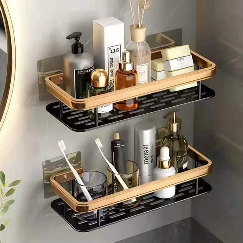 FanzyMarket no-drill aluminum alloy bathroom shower shelf and kitchen organizer mounted on wall, black and gold finish.