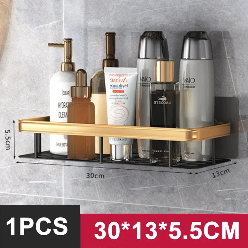No-drill aluminum alloy bathroom shower shelf and kitchen organizer with black and gold finish, wall-mounted for storage.