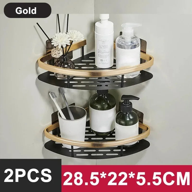 Black and gold no-drill aluminum alloy bathroom shower shelf and kitchen organizer mounted on wall for shampoo and storage.