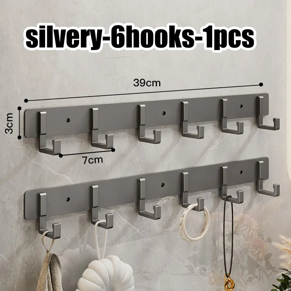 Heavy-duty stainless steel wall-mounted towel and clothes hook with 7 hooks, adhesive no-drill design for bathroom and kitchen.
