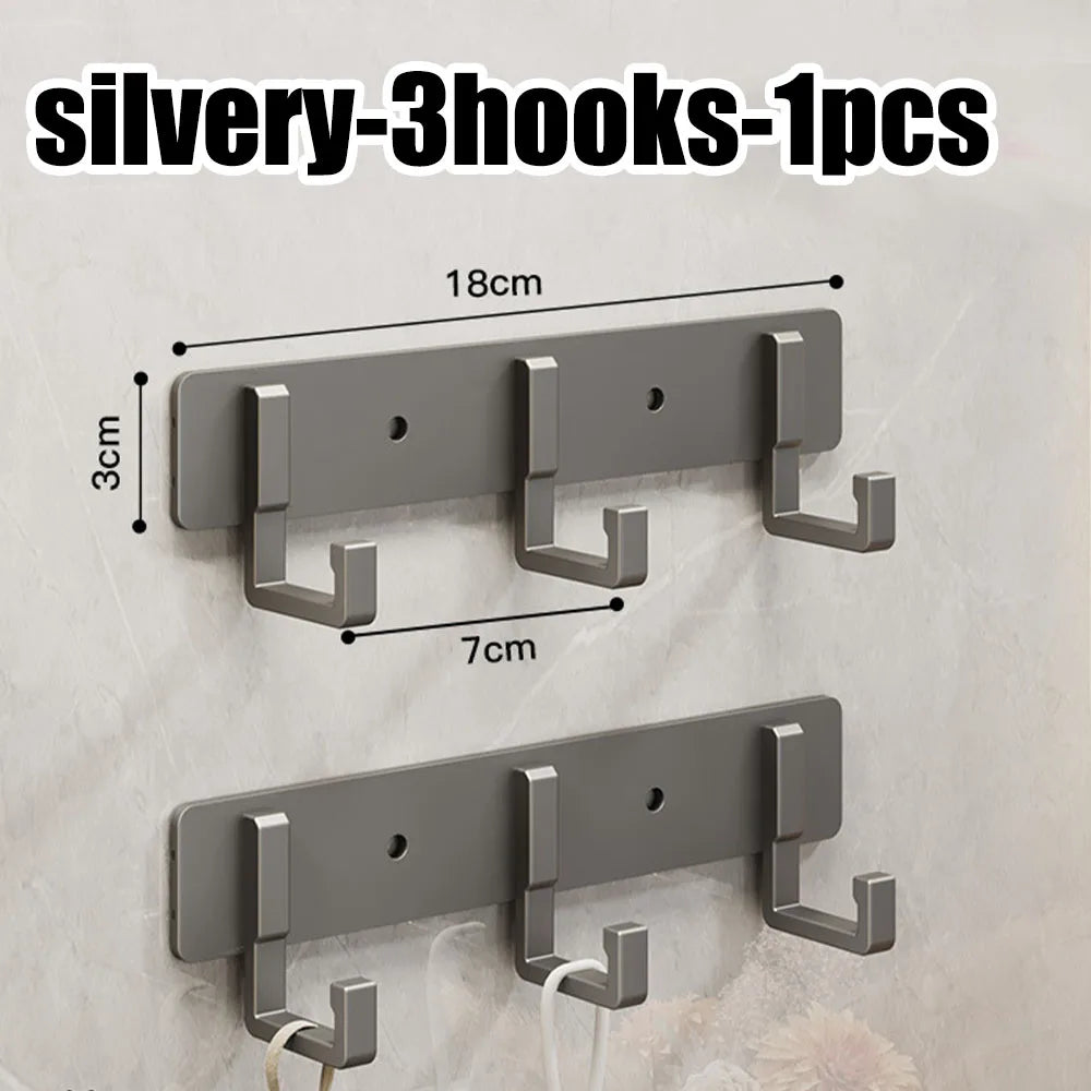 Heavy-duty stainless steel wall-mounted hook with seven adhesive hooks for towels and clothes in bathroom or kitchen.