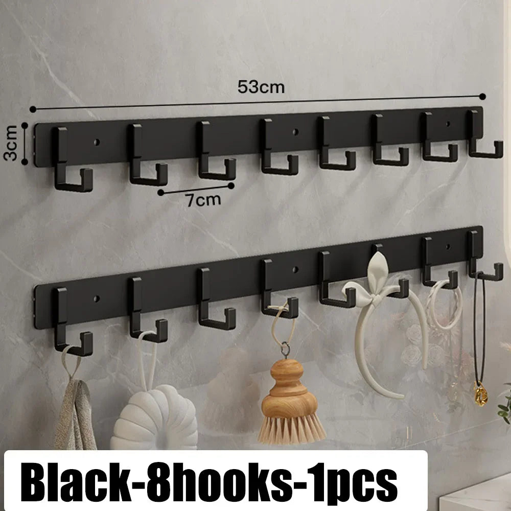 FanzyMarket heavy-duty stainless steel wall-mounted hook with seven no-drill adhesive hooks for bathroom and kitchen storage.
