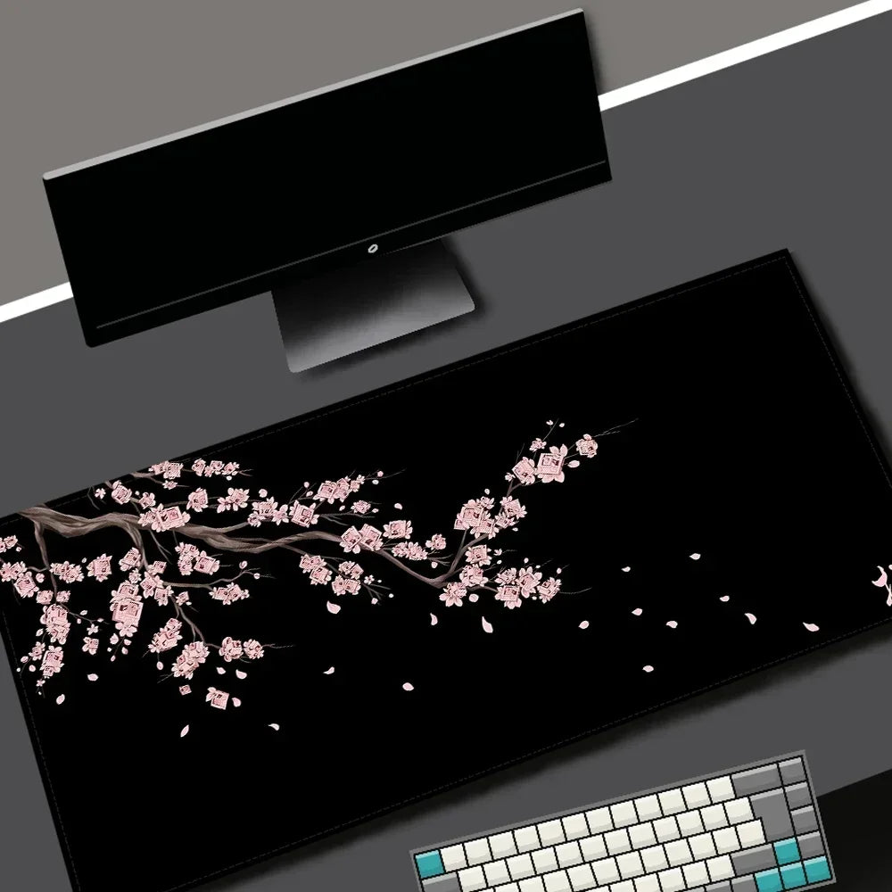 FanzyMarket black Sakura cherry blossom gaming mouse pad with purple design, large non-slip desk mat for office and gaming use.