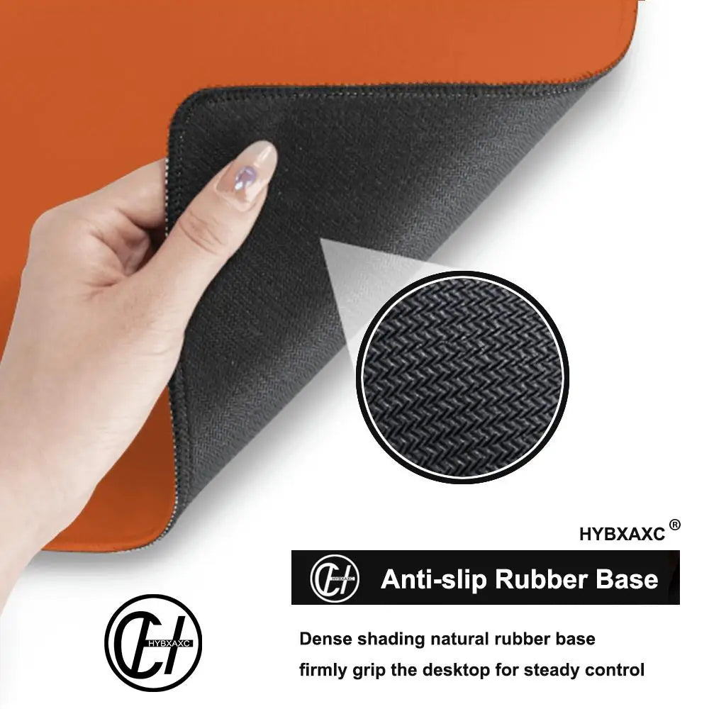 FanzyMarket waterproof gaming mouse pad with anti-slip rubber base, sweat-resistant cloth surface, available in multiple sizes.