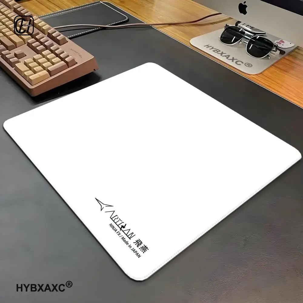 FanzyMarket waterproof gaming mouse pad with anti-slip, anti-sweat cloth surface and rubber base in multiple sizes.
