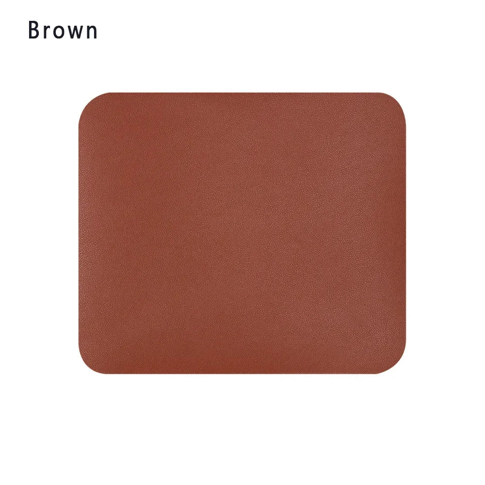 Black leather universal anti-slip mouse pad from FanzyMarket, waterproof, 9.06 x 7.87 inches, ideal for gaming and office use.