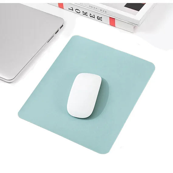 Pink PU leather mouse pad by FanzyMarket, non-slip, waterproof, anti-scratch desk mat for PC, laptop, and gaming setups.