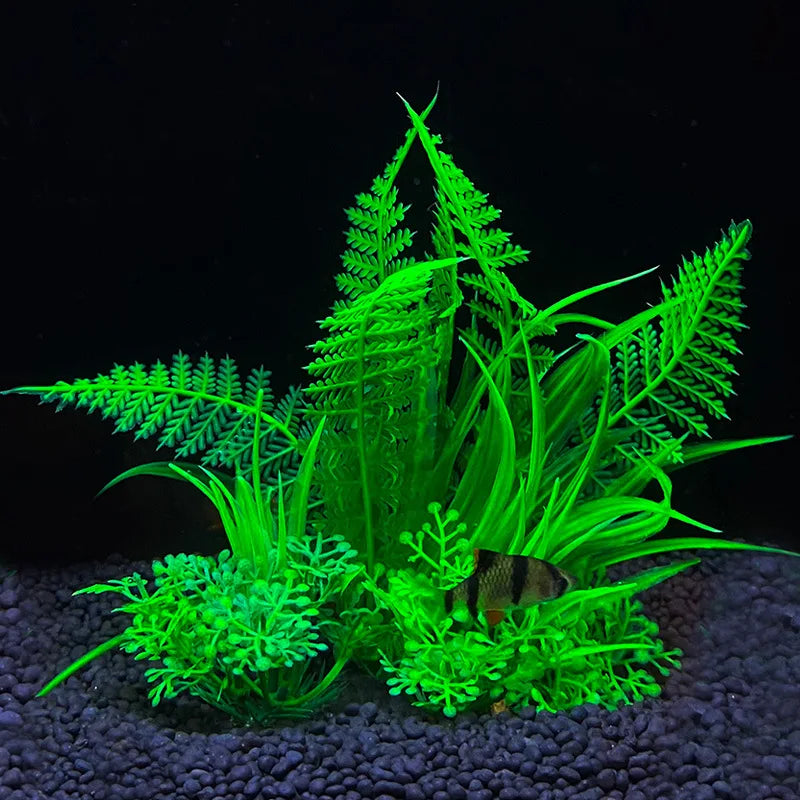 Artificial aquarium plants with green plastic shrubs and resin base, suitable for fish tank decoration.