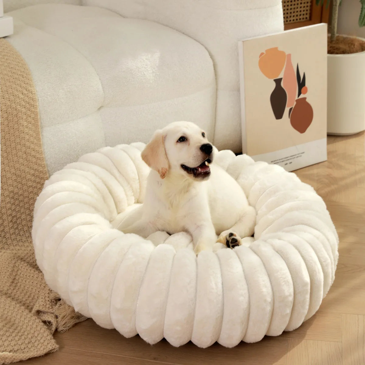Large round washable faux fur pet bed by FanzyMarket, cozy plush sofa for dogs and cats, all-season comfortable pet resting space.