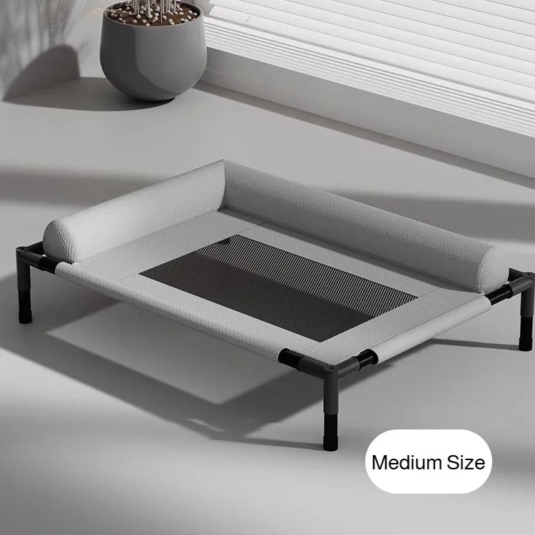 Large moisture-proof elevated pet bed by FanzyMarket with washable breathable mesh for indoor or camping use for dogs and cats.