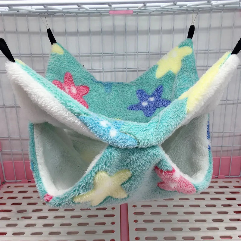 FanzyMarket fleece hammock hideout for small pets like hamsters, guinea pigs, sugar gliders, and rats, in starfish green.