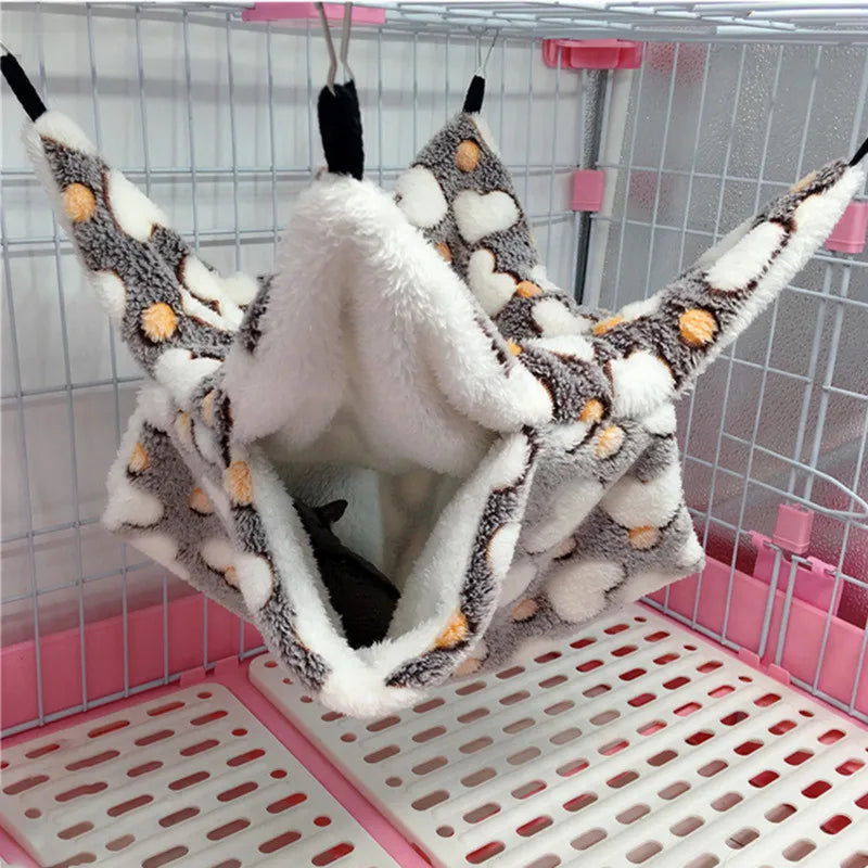 FanzyMarket fleece hammock hideout for small pets like hamsters, guinea pigs, sugar gliders, and rats in green, available in two sizes.