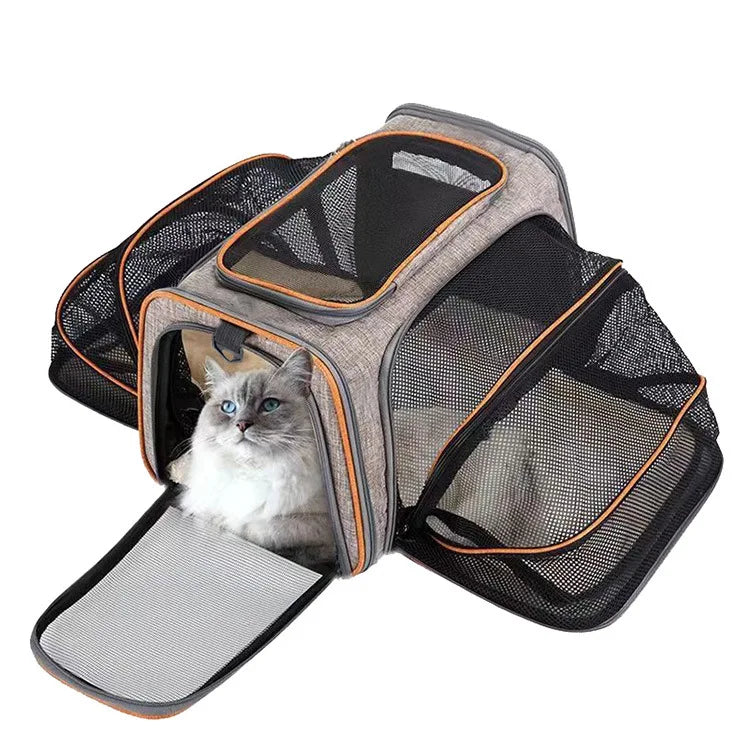FanzyMarket foldable mesh pet carrier for cats and small dogs, soft-sided, breathable, expandable travel tote with handle.