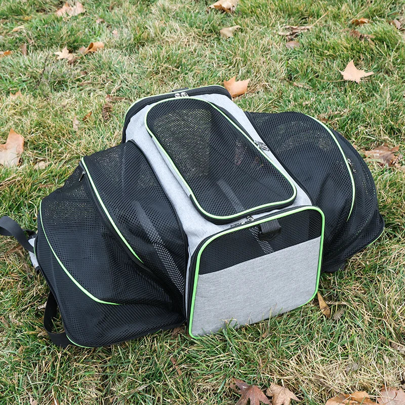 FanzyMarket foldable mesh pet carrier for cats and small dogs, soft-sided, expandable, breathable, handheld travel tote.
