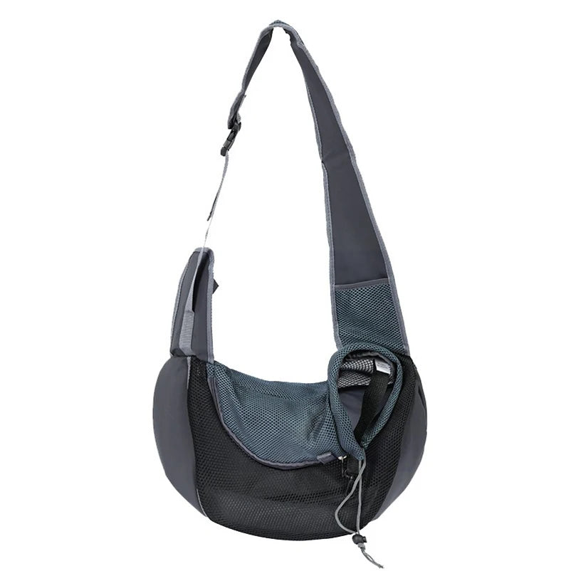 Light blue FanzyMarket portable nylon pet carrier sling for small dogs and cats, hands-free shoulder crossbody bag.