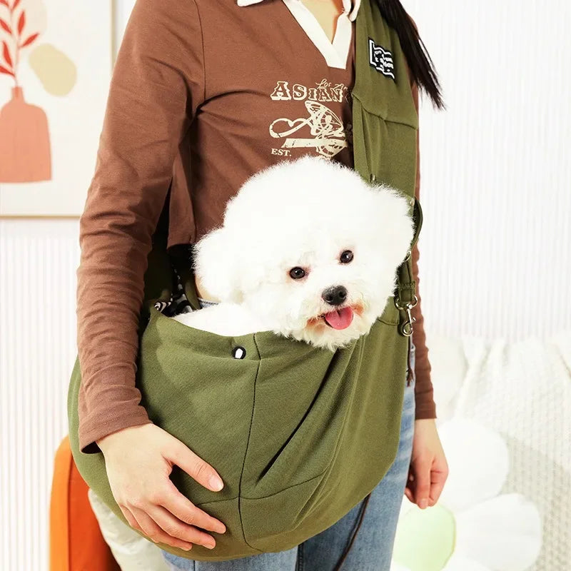 FanzyMarket pink pet sling carrier for small dogs and cats, crossbody design, portable travel bag, supports pets up to 7.5 kg.