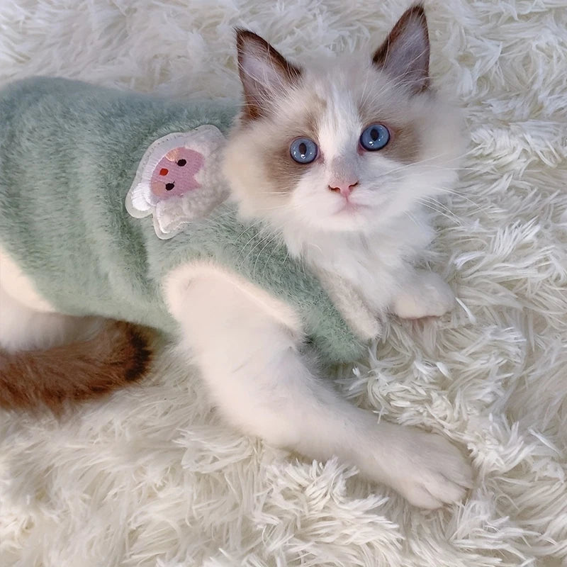 FanzyMarket warm pink pet sweater vest for cats and small dogs, cozy winter pet apparel with a comfortable fit.