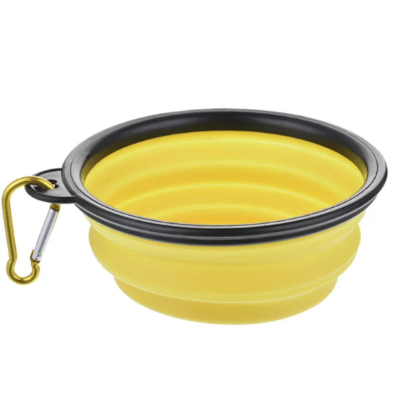 Green collapsible TPR travel pet bowl for dogs and cats, showing the portable, foldable design with 650ml capacity.