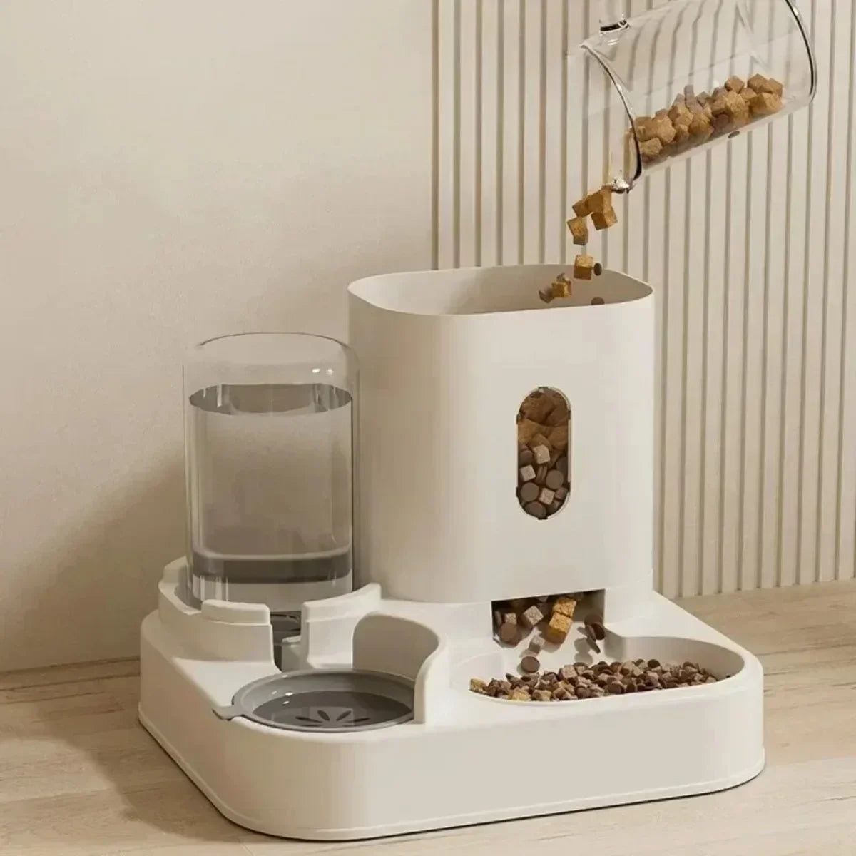 FanzyMarket automatic non-electric pet feeder with water fountain, large capacity gravity-fed food and water dispenser for dogs and cats.
