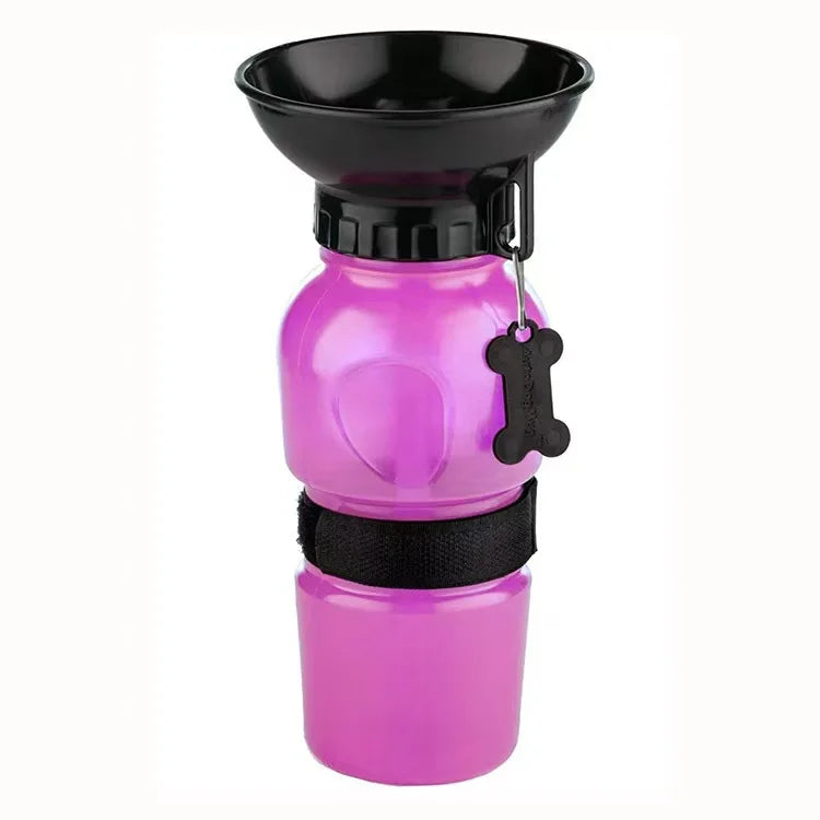 Pink 500ml portable dog and cat travel water bottle with built-in drinking bowl by FanzyMarket, ideal for pet hydration on the go.