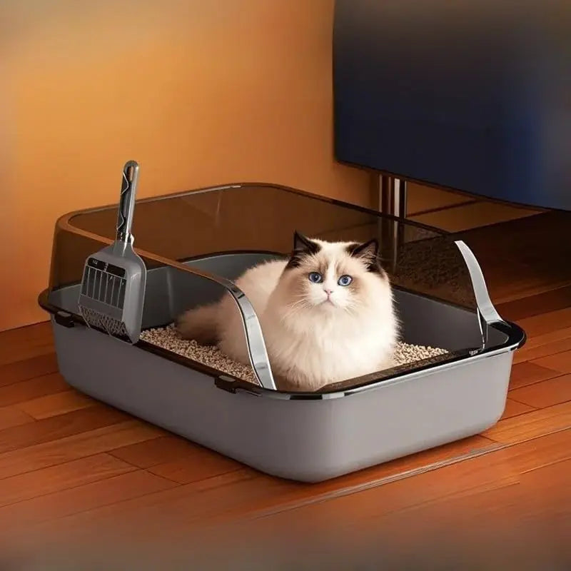 Gray semi-enclosed cat litter box with high sides, splashproof design for indoor use by FanzyMarket pet supplies.