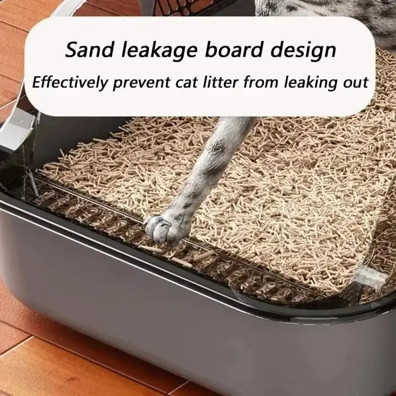 Gray semi-enclosed cat litter box by FanzyMarket with high sides, splashproof design, ideal for indoor kittens and cats.