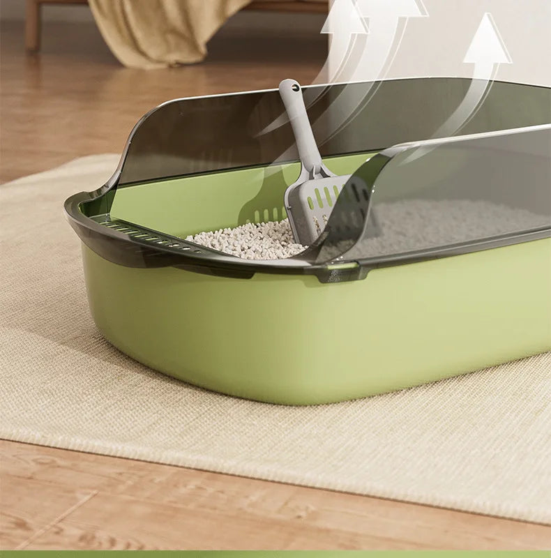 FanzyMarket semi-enclosed cat litter box with anti-splash plastic tray, large capacity in green, measuring 15.7x10.2x5.9 inches.