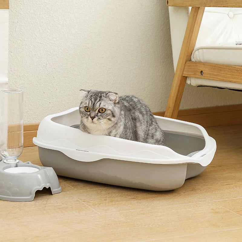 FanzyMarket semi-enclosed cat litter box with splash-proof design, large size, anti-scatter features, ideal for pet hygiene.