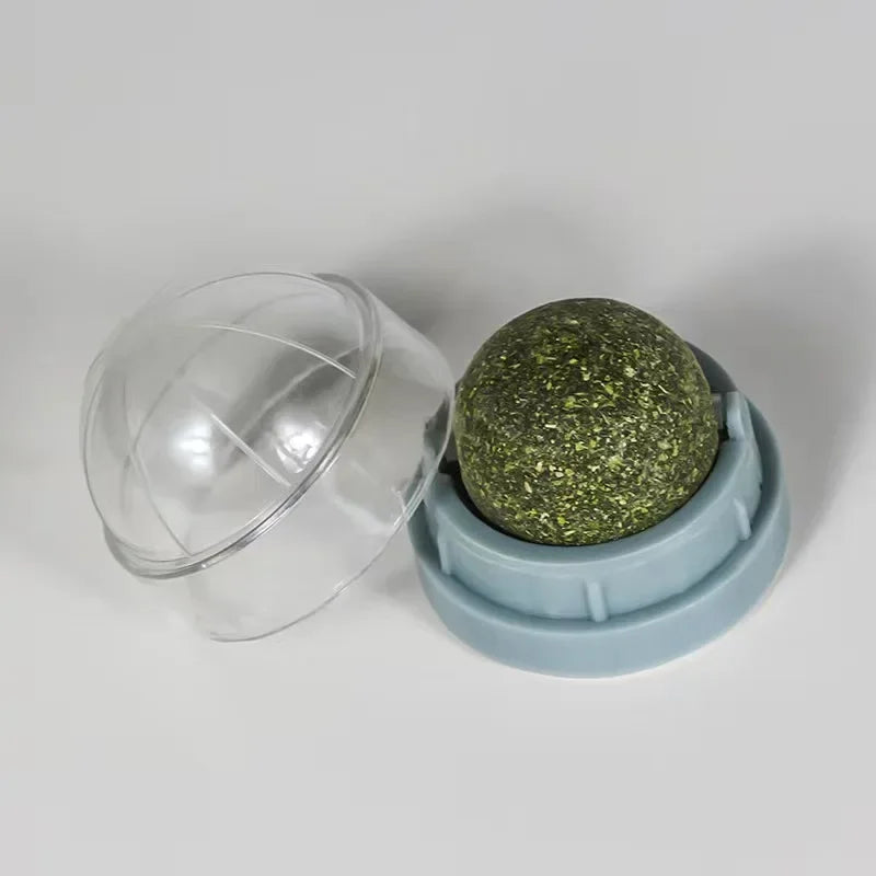 FanzyMarket wall-mounted catnip ball toy for cats, with mint ball and base, self-rotating interactive scratching and dental health toy.