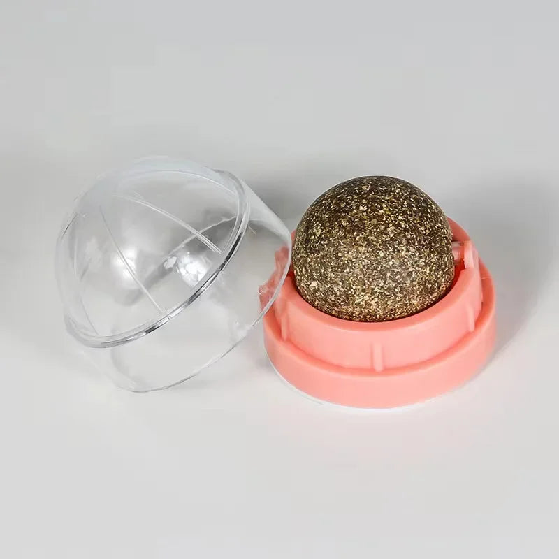 FanzyMarket wall-mounted catnip ball toy for cats, includes mint ball and base, self-rotating for scratching and dental health.