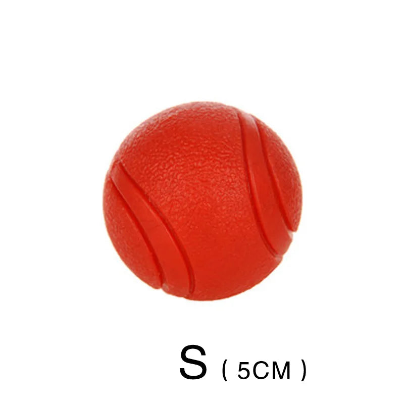 FanzyMarket bite-resistant rubber dog ball toy in red, chew-proof fetch toy for dogs and puppies, sizes S to XL.