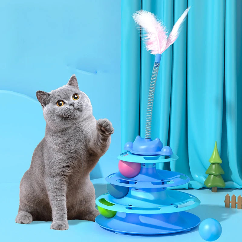 Dark blue FanzyMarket interactive cat toy tower with turntable track, rolling balls, and feather teaser for kitten entertainment.