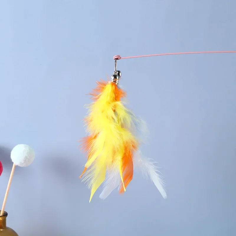 FanzyMarket interactive cat feather toy refill kit with feather birds, faux worm, foam ball, and bell for kittens.
