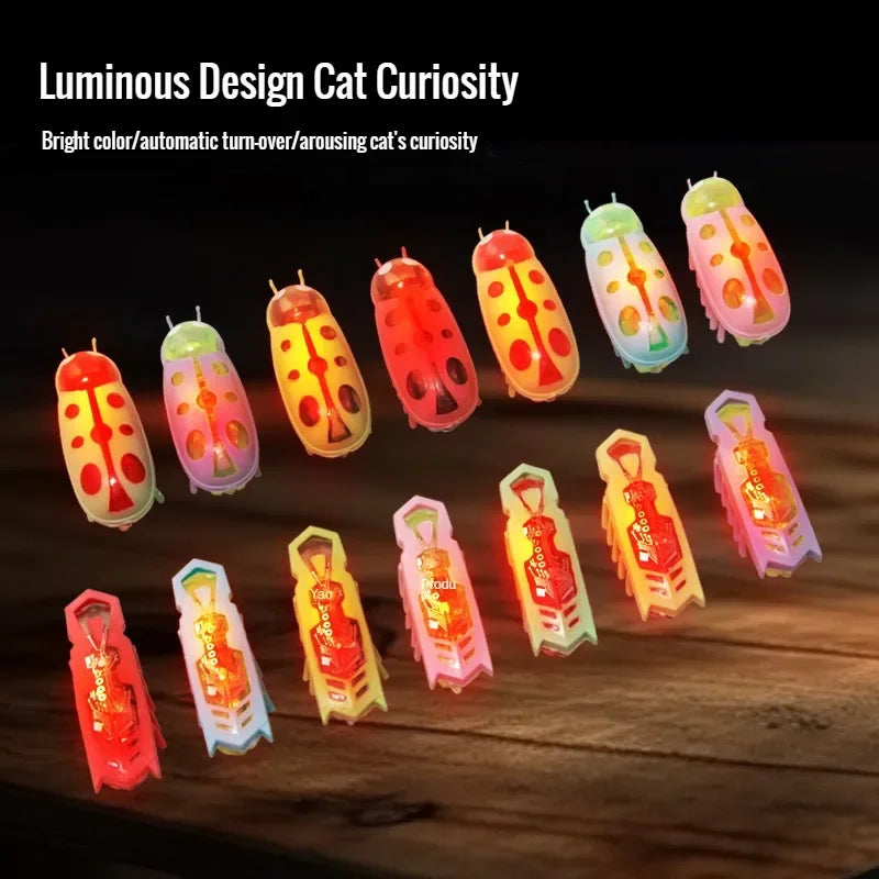 FanzyMarket battery-operated interactive bug toy for kittens, green and black with vibration and obstacle avoidance feature.