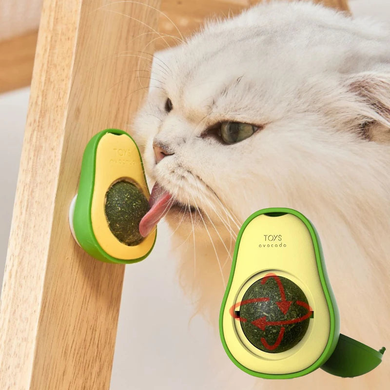 FanzyMarket rotating stick-on catnip ball toy featuring avocado design, ideal for licking and teeth cleaning for cats.
