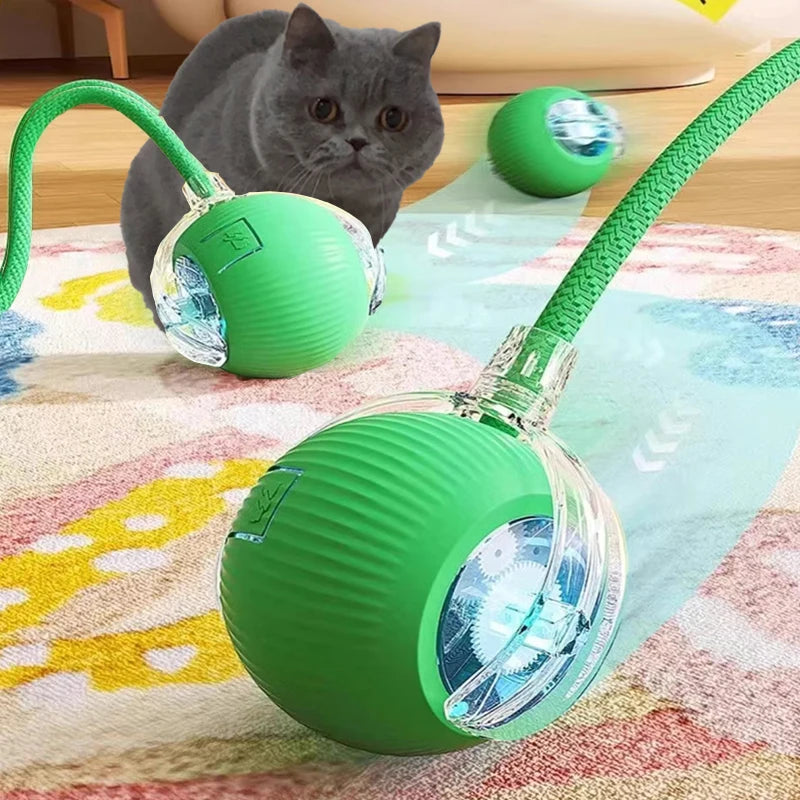 Rechargeable automatic rolling cat ball toy by FanzyMarket, interactive smart toy for cats and kittens, green tail design, 2.36 x 2.75 inches.