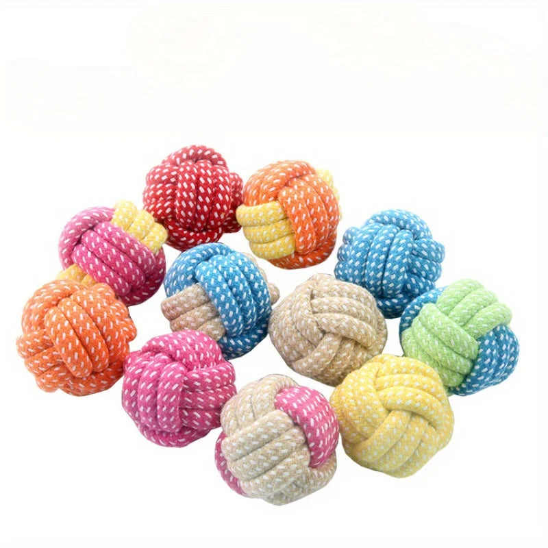 Candy-colored cotton rope ball chew toy for dogs and cats, durable tug and fetch pet toy by FanzyMarket.