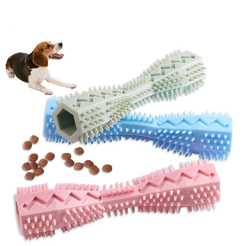 Pink TPR dog chew stick from FanzyMarket, bite-resistant treat-dispensing toy for teeth cleaning and interactive play.